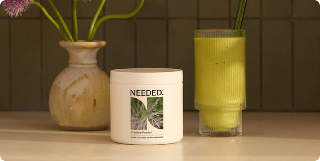 Women's Creatine powder mixed into a drink