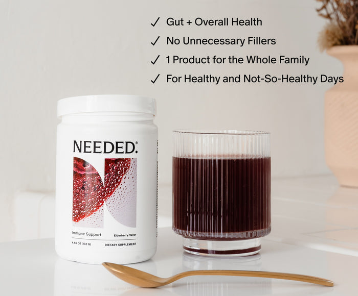 Needed Immune Support beside a glass of elderberry drink. Gut + Overall Health, No Unnecessary Fillers, 1 Product for the Whole Family, For Healthy and Not-So-Healthy Days